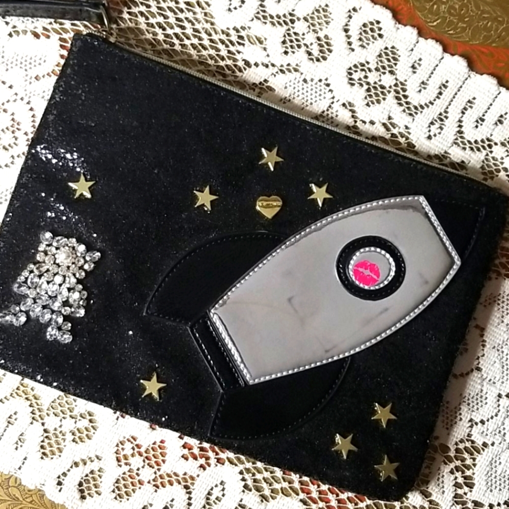 Betsey Johnson-Diamond studded astronaut wristlet